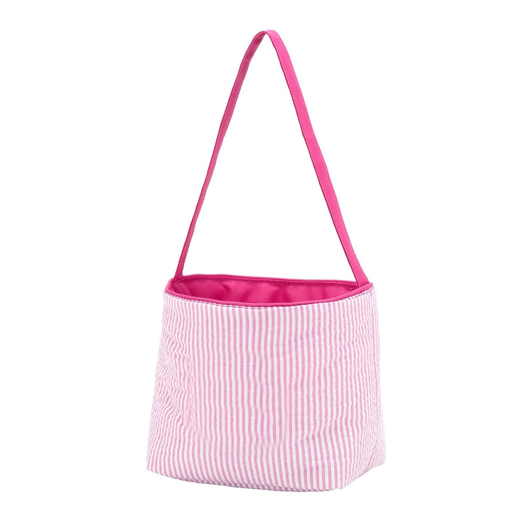 Seersucker bucket bag in natural fabric with polyester lining.