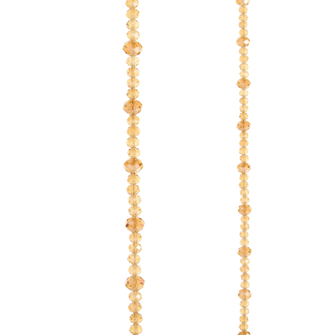 Close-up of a 6-foot champagne-colored faceted bead garland on a white background.