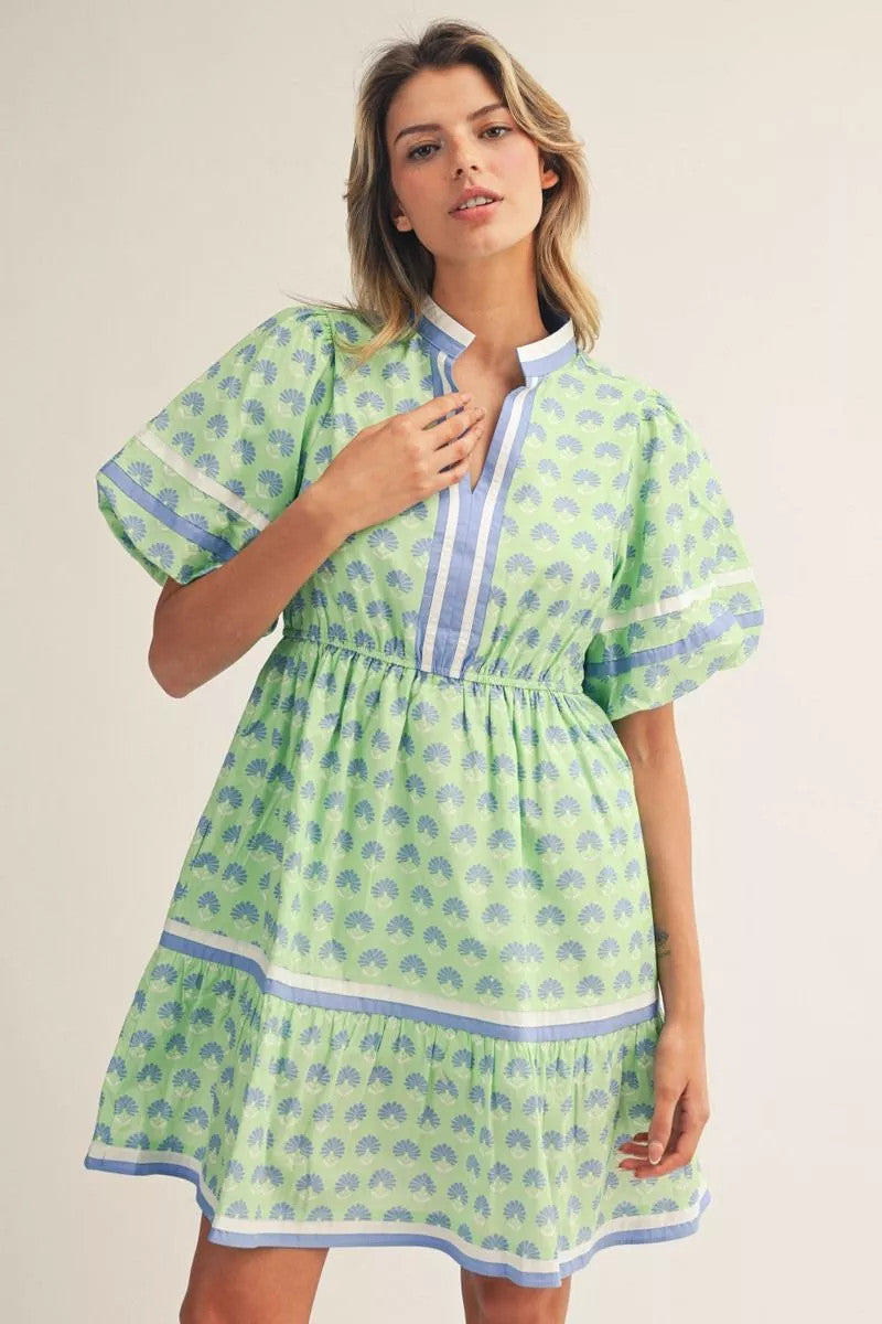 Women's boho floral print cotton dress with puff sleeves, tiered silhouette, and side pockets.