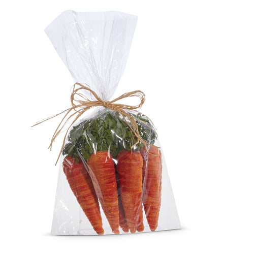 Set of six 9-inch orange foam carrots with green tops in a clear bag tied with a twine bow.