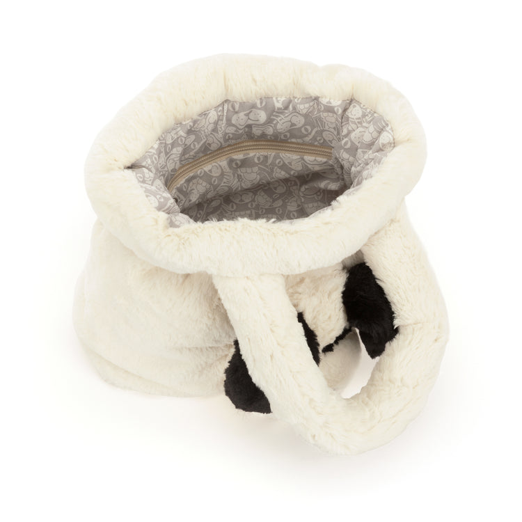 Open view of the Rufferty Puppy Handbag showing the patterned lining and interior zipper pocket.