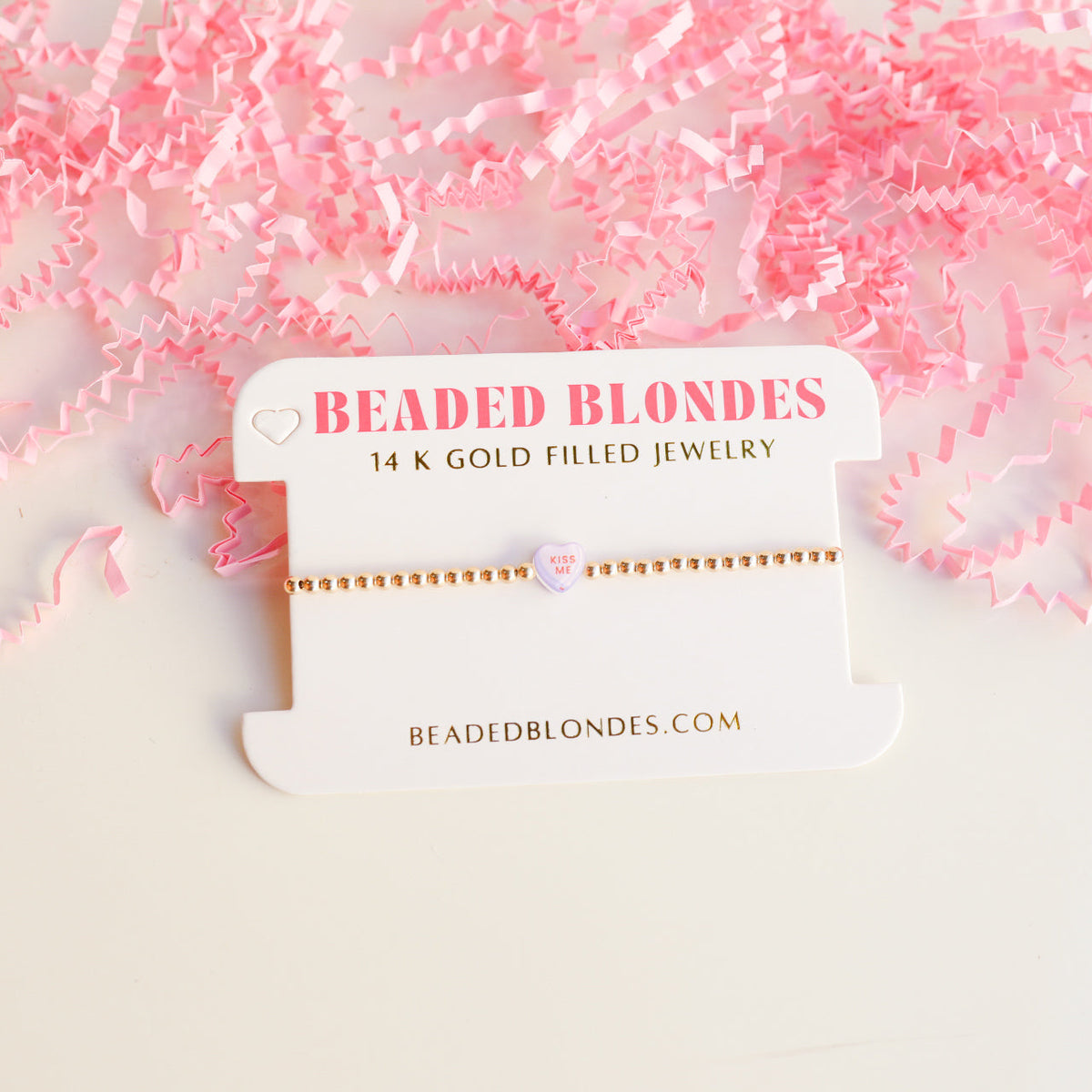 Kiss Me BB Bead Bracelet featuring gold-filled beads on durable elastic string.