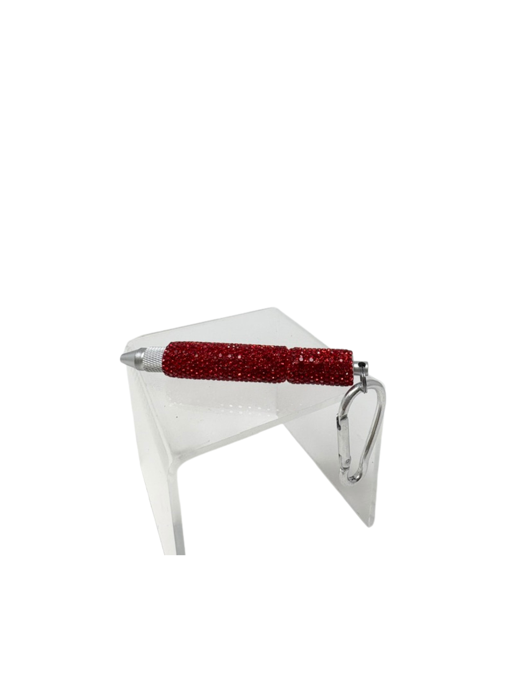 Red rhinestone multi-functional keychain pen with a silver carabiner clip on a clear stand.