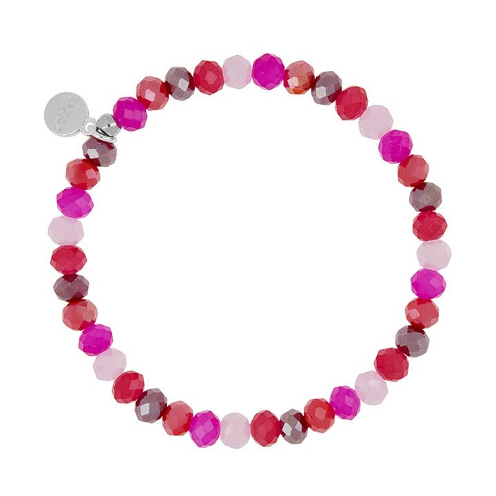Nashville Creation Bracelet featuring faceted glass beads in shades of pink, red, and purple.
