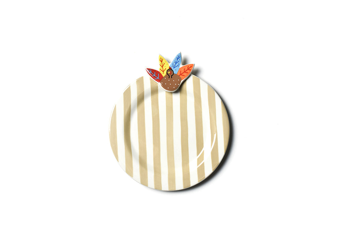 Ceramic turkey embellishment plate with a white background.