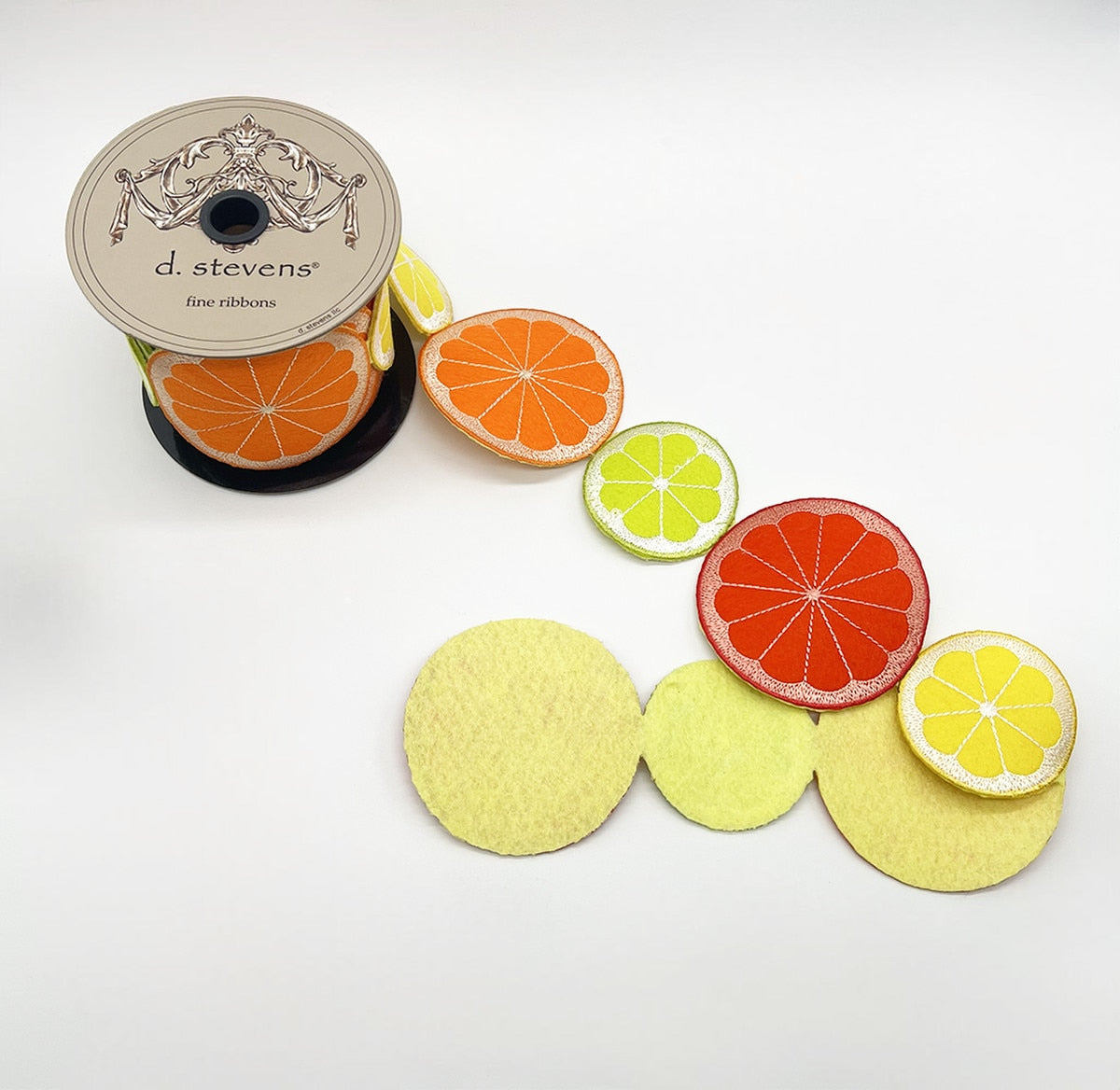 Felt embroidery ribbon featuring citrus fruit designs in lemon, lime, and orange.