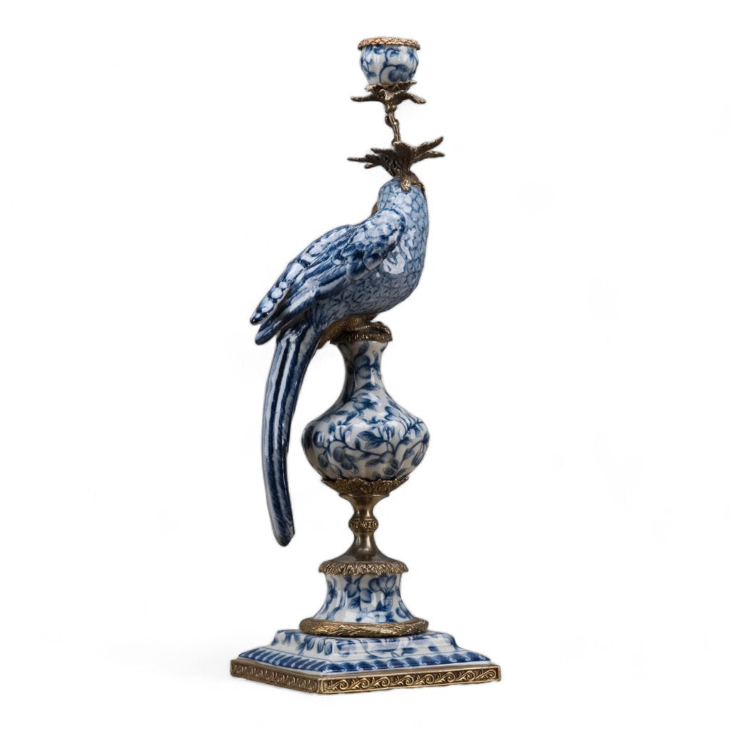 Blue and white porcelain parrot candle holder with bronze ormolu accents on a square base.