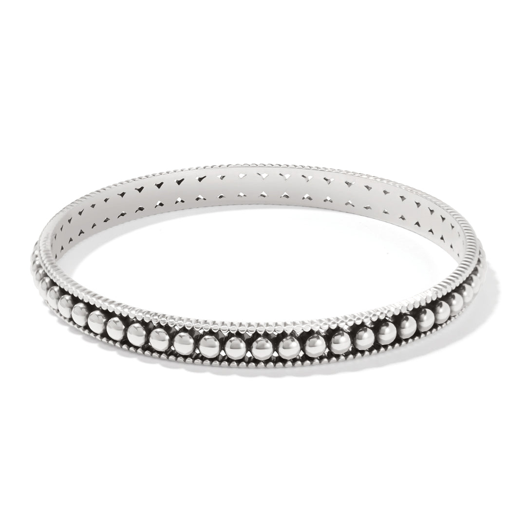 Silver plated Pretty Tough Pierced Slim Bangle with a beaded texture and cutout details.