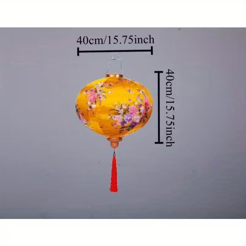 Round orange silk lantern with a smooth cylindrical shape.