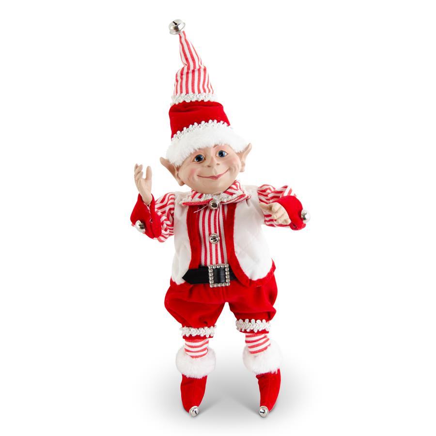 Posable elf figurine in red velvet fabric with gold bells attached to its hat and dress.