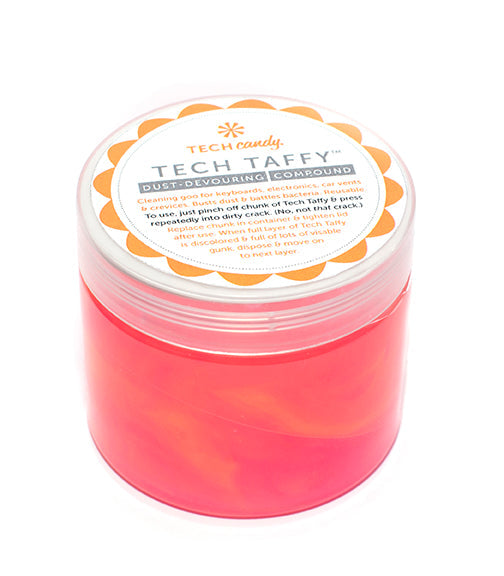 A clear jar of pink Tech Taffy dust-devouring cleaning compound with an orange and white label.