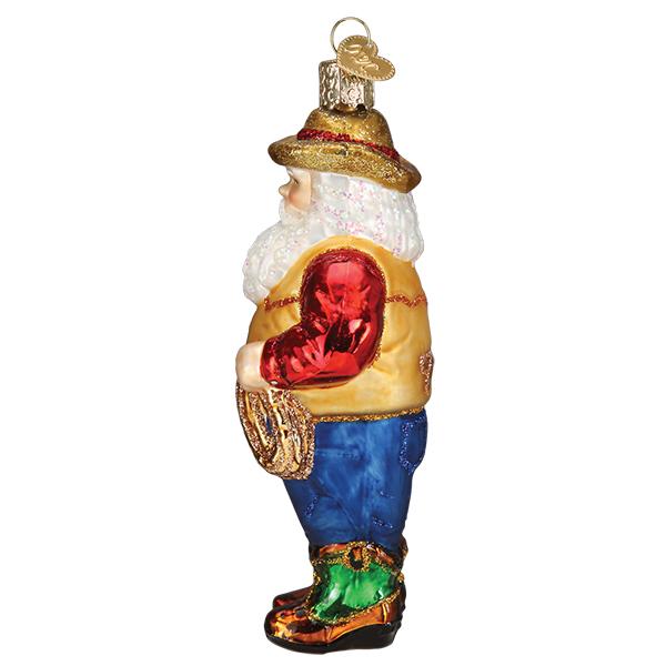 Side view of a glass Western Santa ornament wearing a cowboy hat, red shirt, and blue jeans.