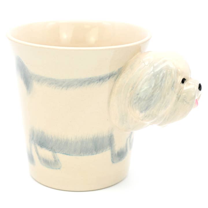 Hand-painted 10 oz Maltese mug with a 3D dog head handle and painted body on a cream ceramic base.