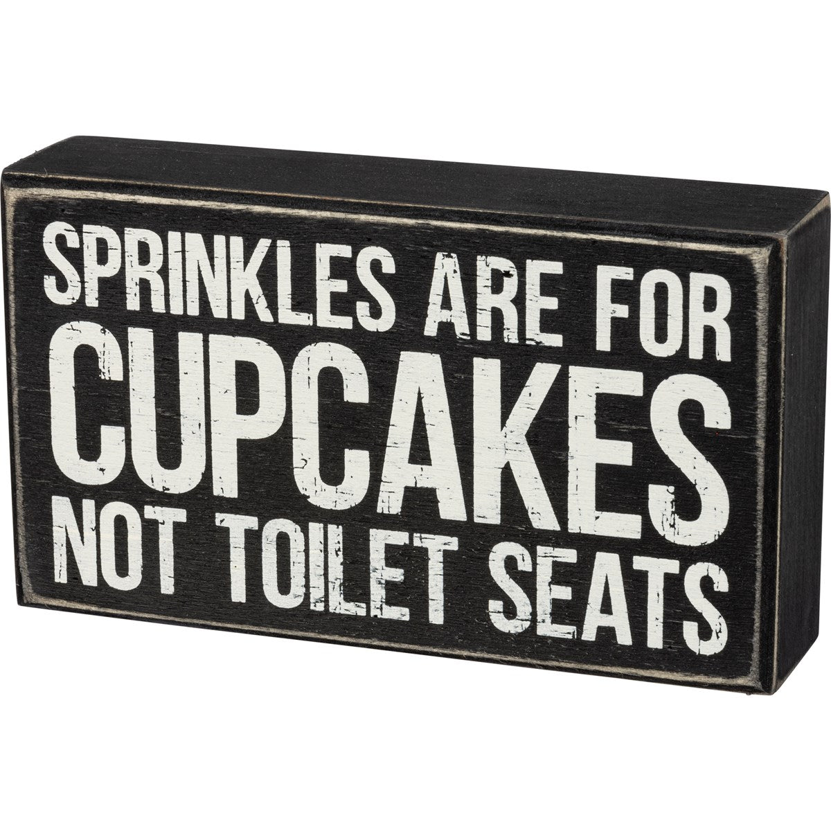 Black wooden box sign with white distressed text that reads "SPRINKLES ARE FOR CUPCAKES NOT TOILET SEATS".