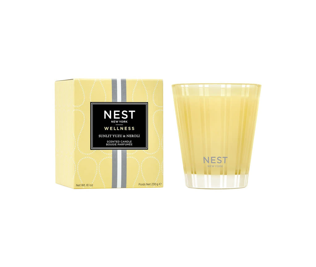 Nest Classic Candle in a clear glass jar with an off-white wax pillar.