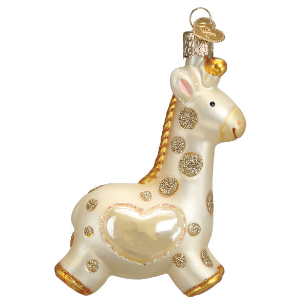 Baby's First Christmas Giraffe Ornament, a cream glass giraffe with gold glitter spots and a heart.