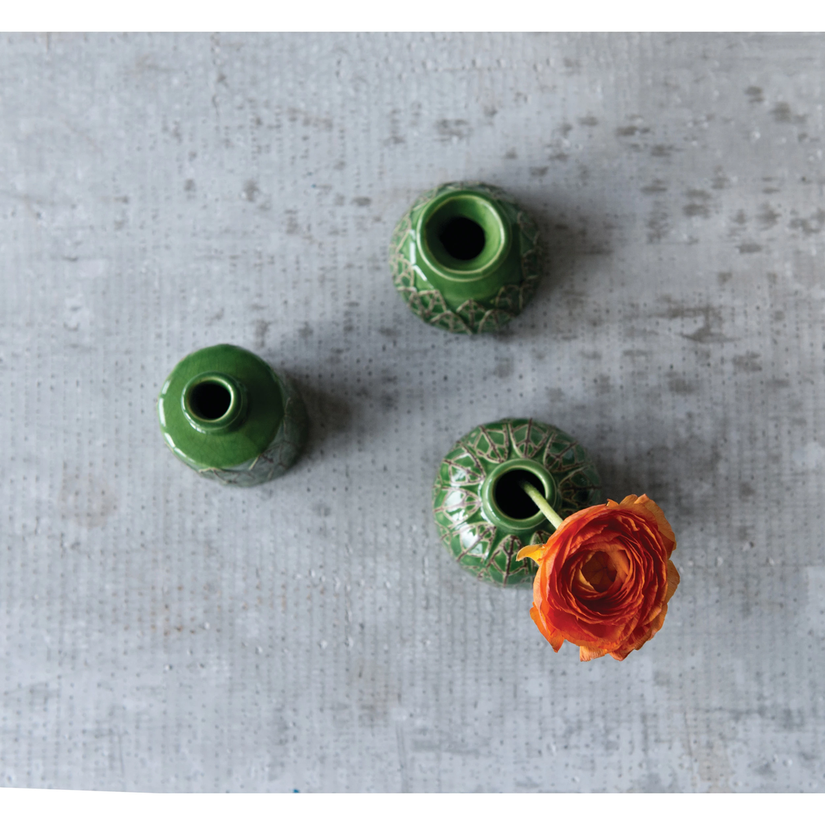 Embossed stoneware vase in neutral tone with textured surface