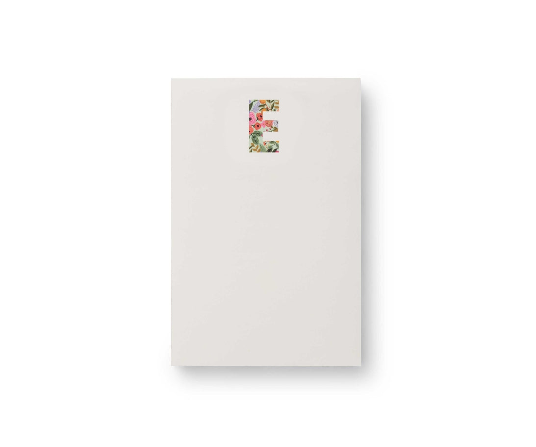 Garden Party monogram notepad with tear-off sheets in a floral pattern.