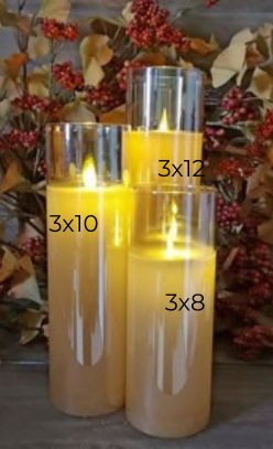 Three moving flame LED glass pillar candles in 3x8, 3x10, and 3x12 sizes with a fall leaf backdrop.