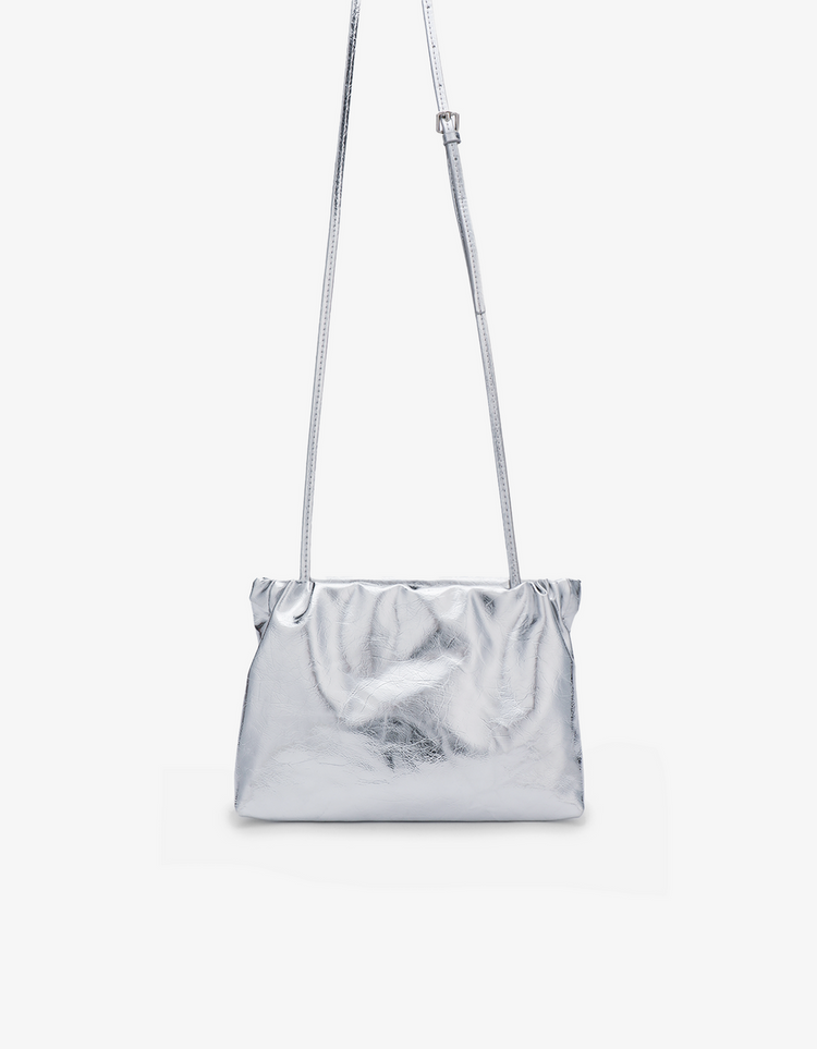 Ophelia clutch in light gold hardware with adjustable crossbody strap