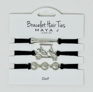 Set of 3 black bracelet hair ties with silver golf-themed charms: a golf club, a golf cart, and three golf balls.