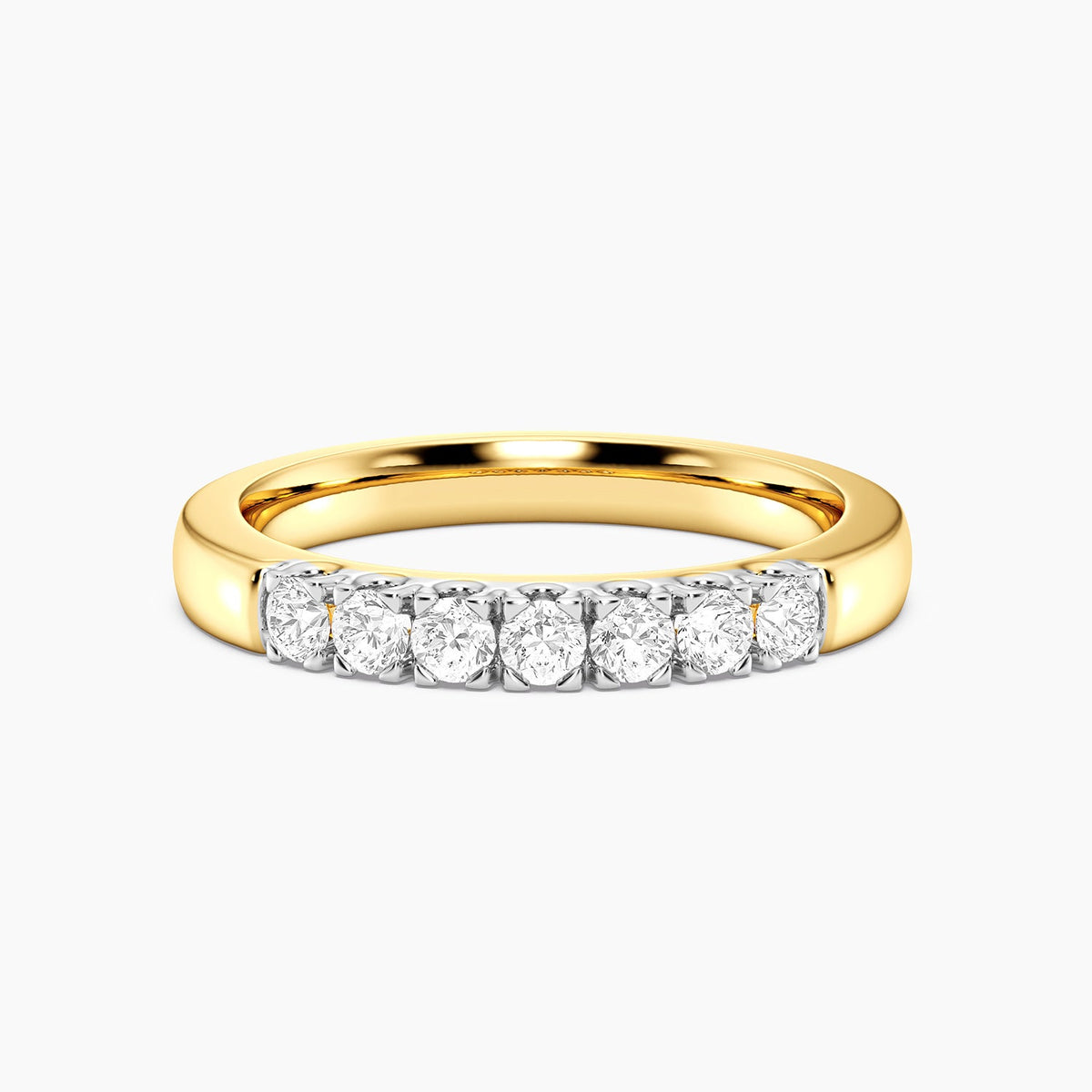 Gold band ring with a round lab-grown diamond center stone