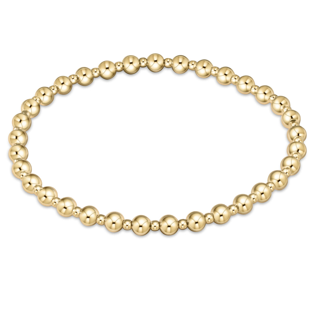 Classic Grateful 4mm and 2mm 14kt gold-filled bead stretch bracelet.