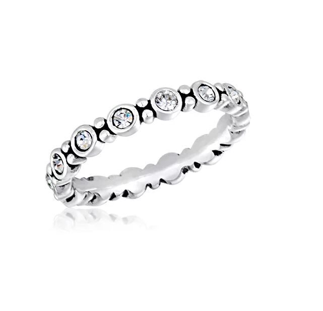 Stackable ring in gold-tone metal with a smooth band design.