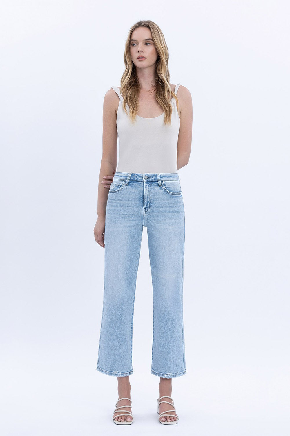 Cindy high-rise light wash slim wide jeans in a crop length with visible stretch fabric texture.
