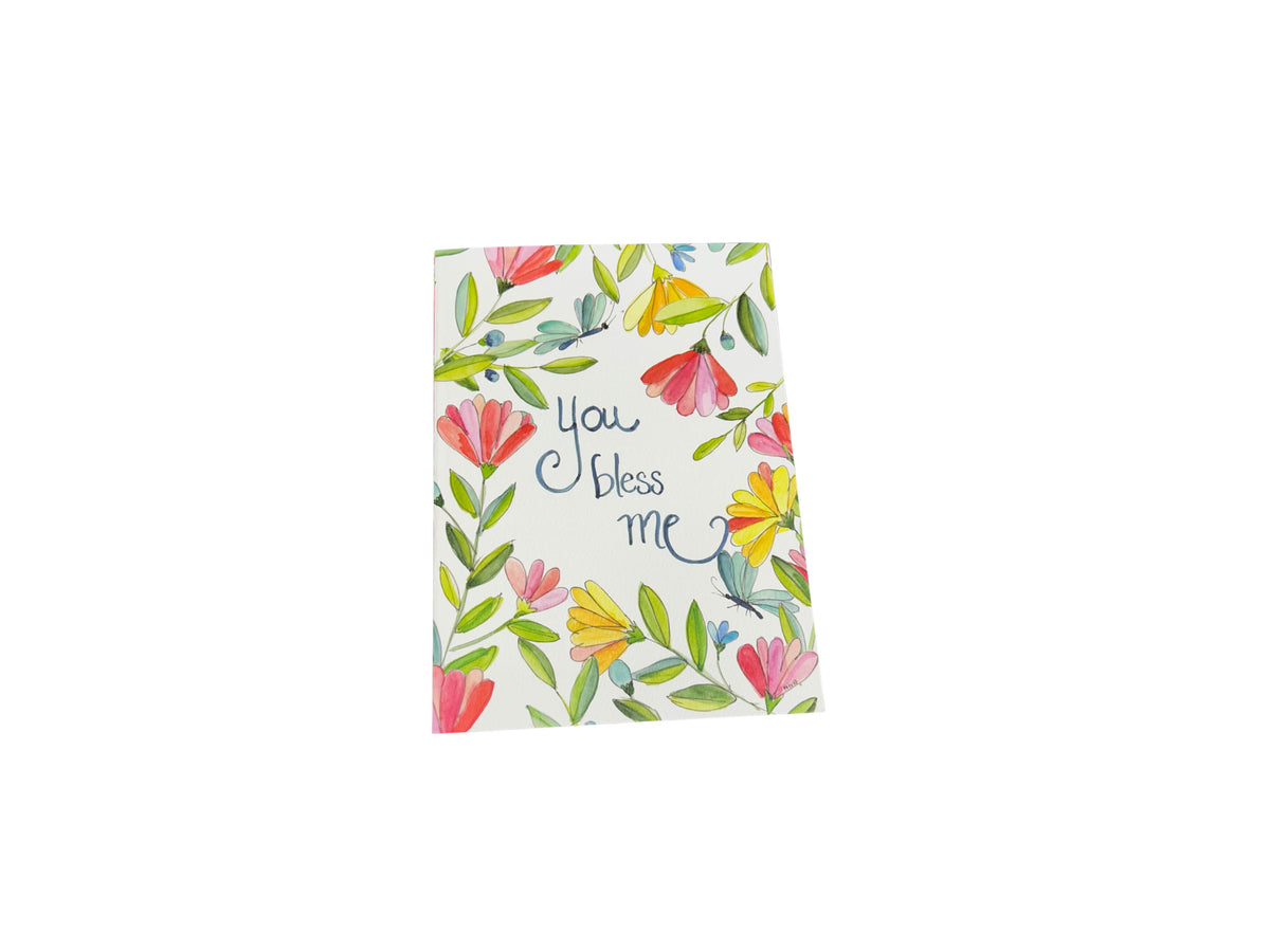 Watercolor greeting card with floral border and the handwritten message "You bless me".