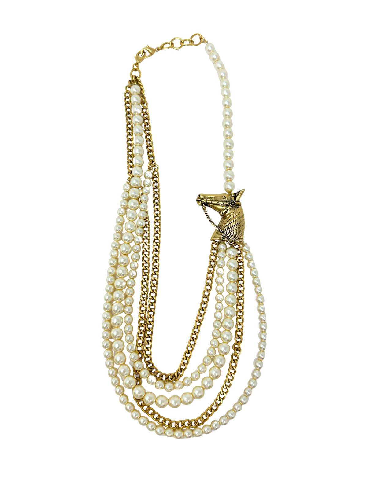 Multi-strand necklace with white pearls, gold chains, and a gold horse head charm.