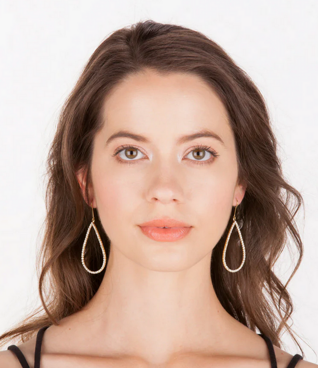 Handmade Louis earrings featuring a long drop silhouette with natural stone accents.