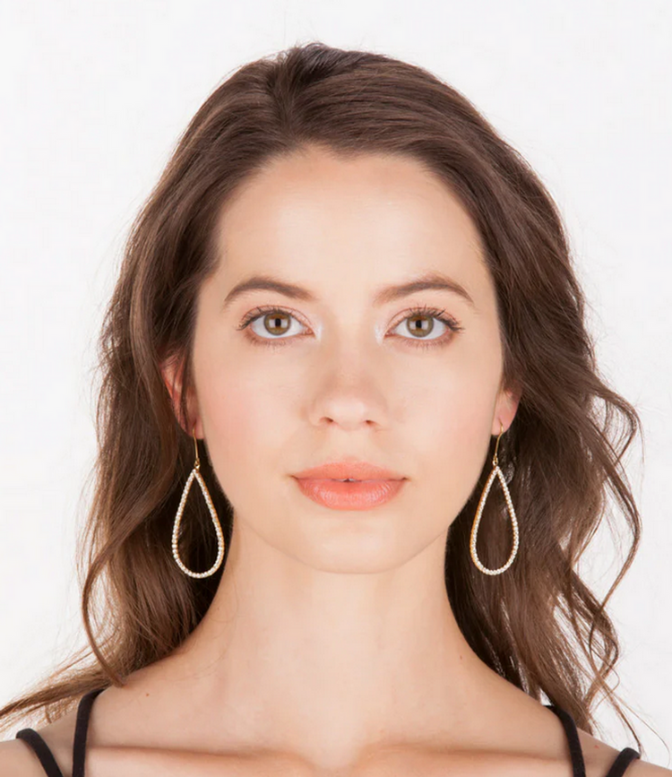Handmade Louis earrings featuring a long drop silhouette with natural stone accents.