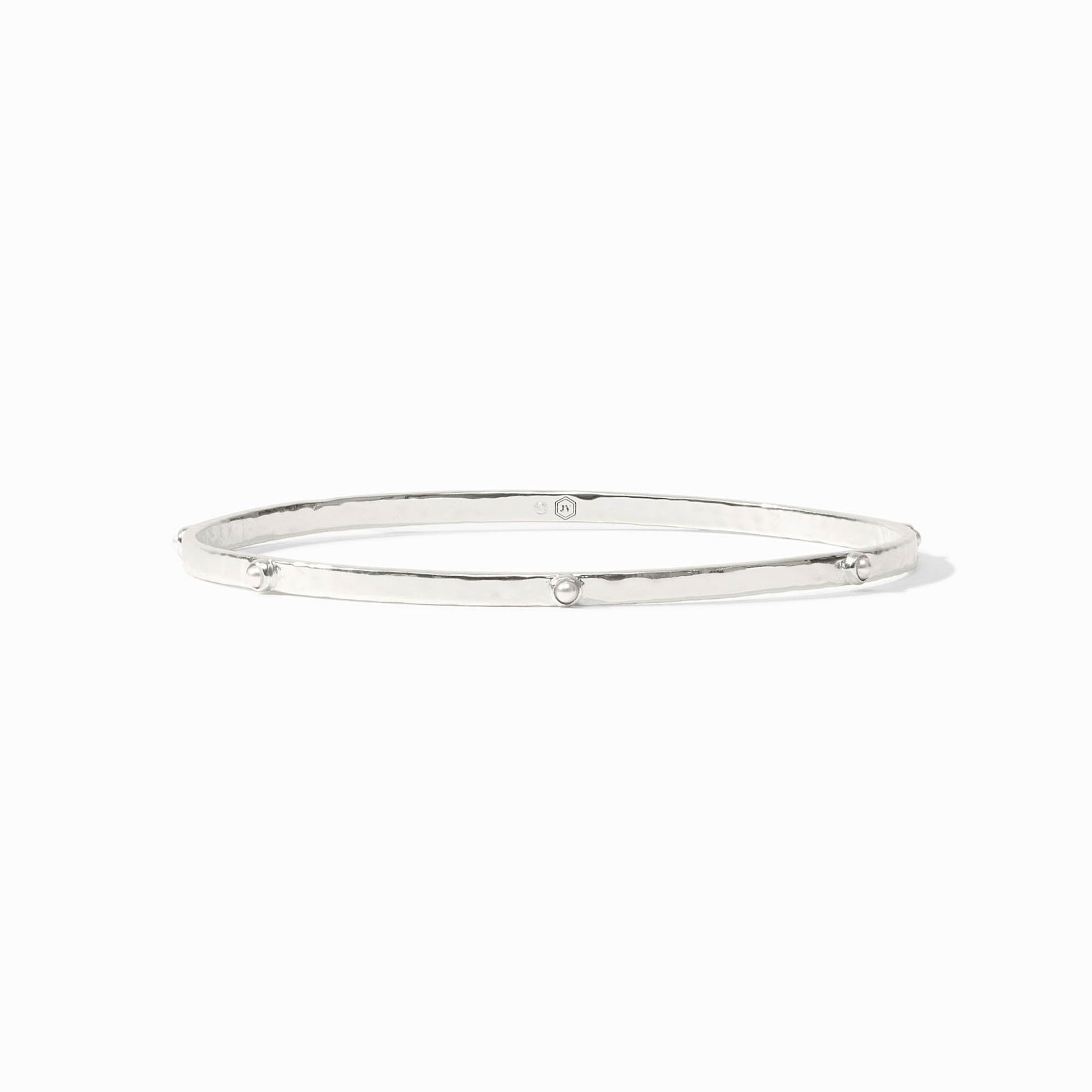 Lightly hammered gold bangle with gemstone stations