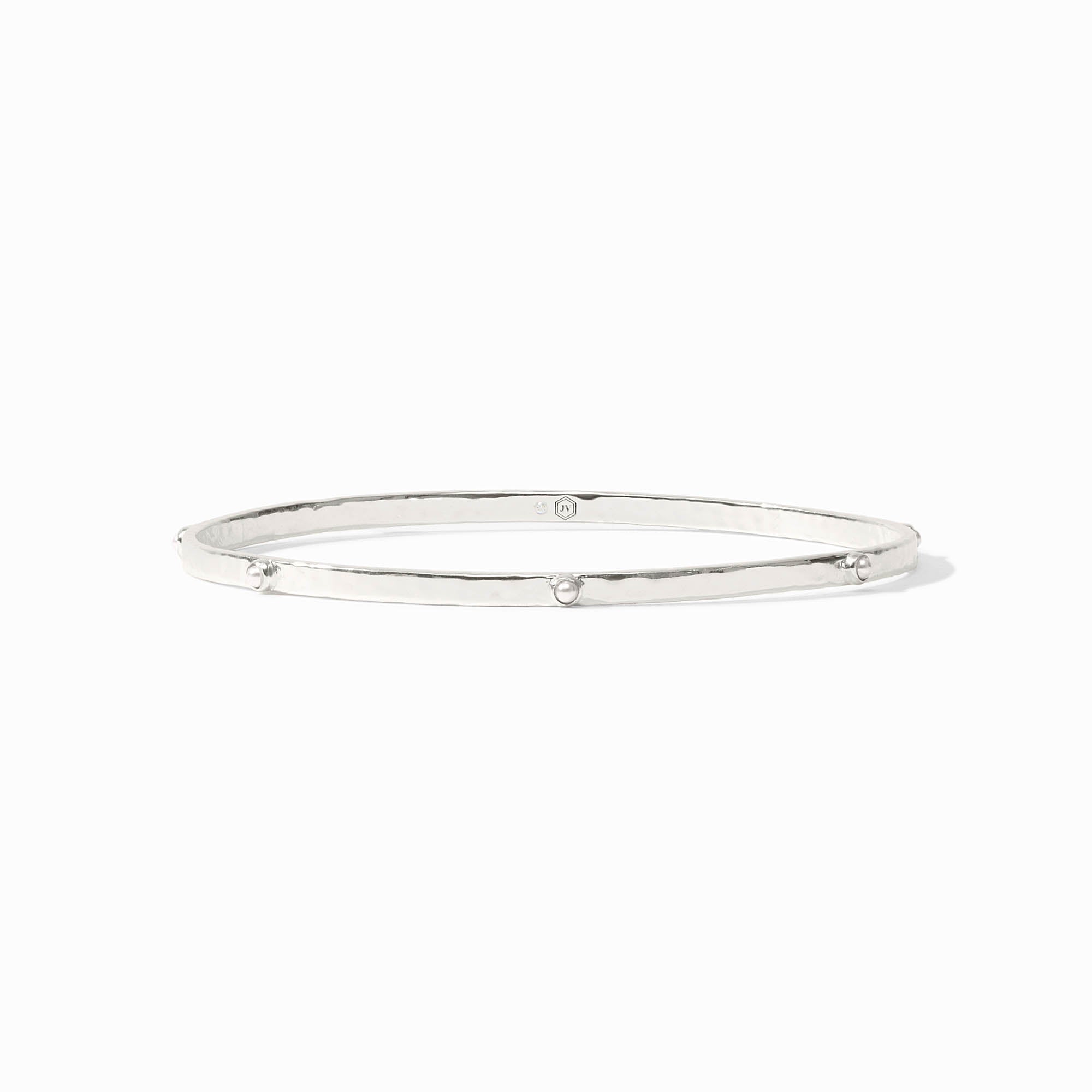 Lightly hammered gold bangle with gemstone stations