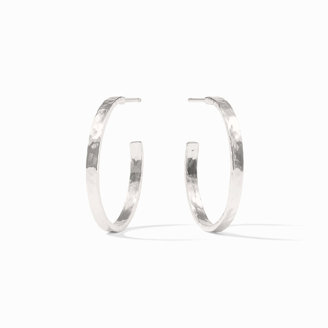 Lightly hammered silver hoop earring with pure silver plated backs.