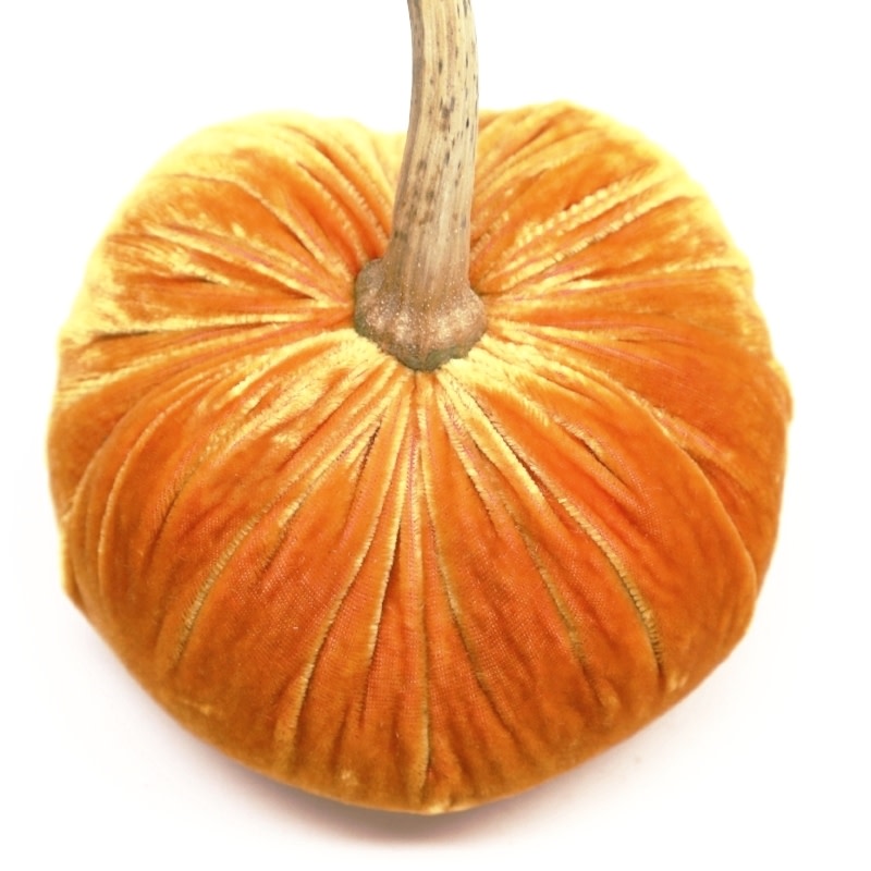 A 3-inch orange silk velvet pumpkin with a natural brown stem, handmade with pleated fabric.