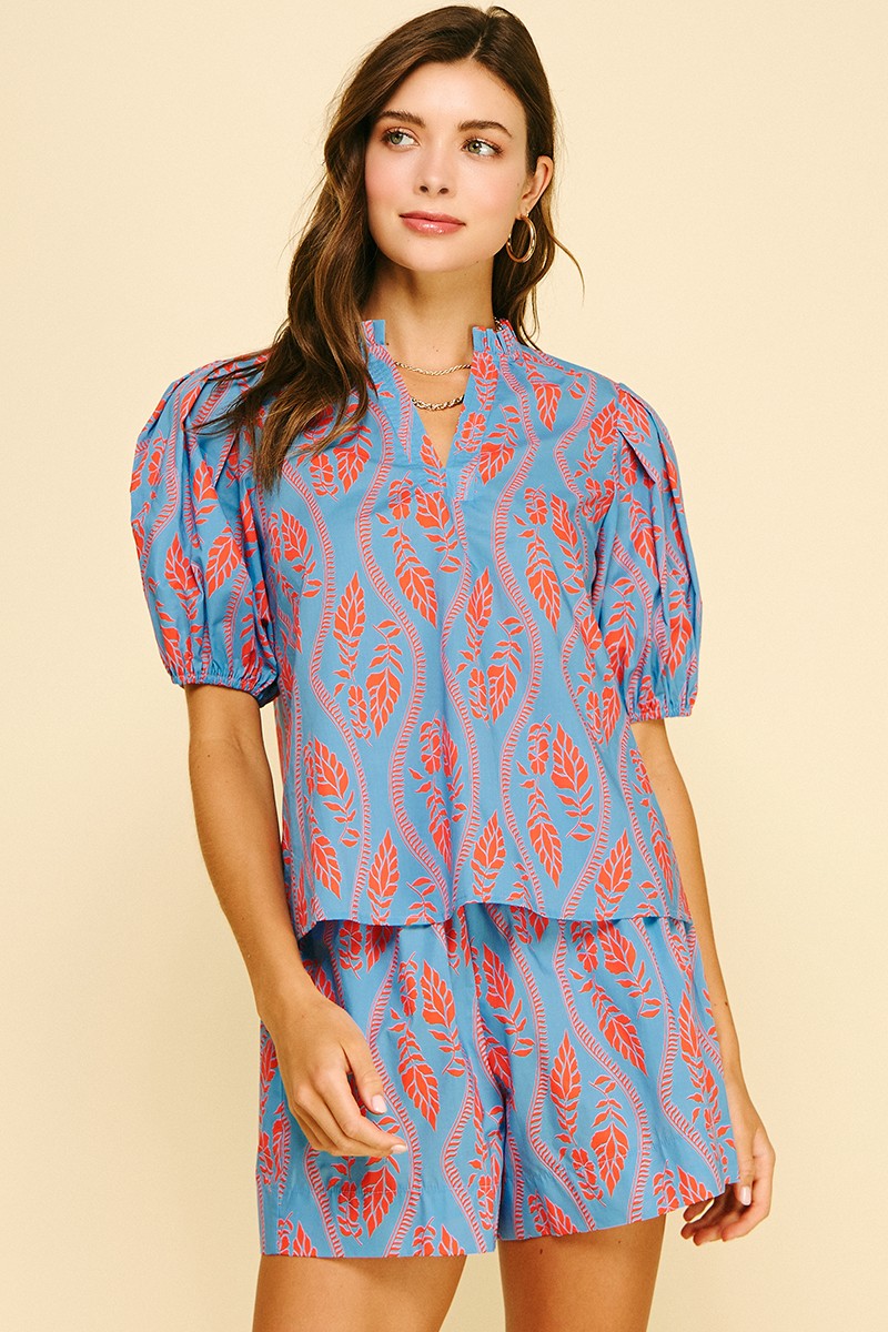 Ashley Botanical Print Blouse in sky blue cotton with coral leaf block print and relaxed silhouette.