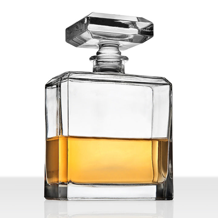 Clear semi-handmade crystal whiskey decanter with a classic curved spout silhouette.