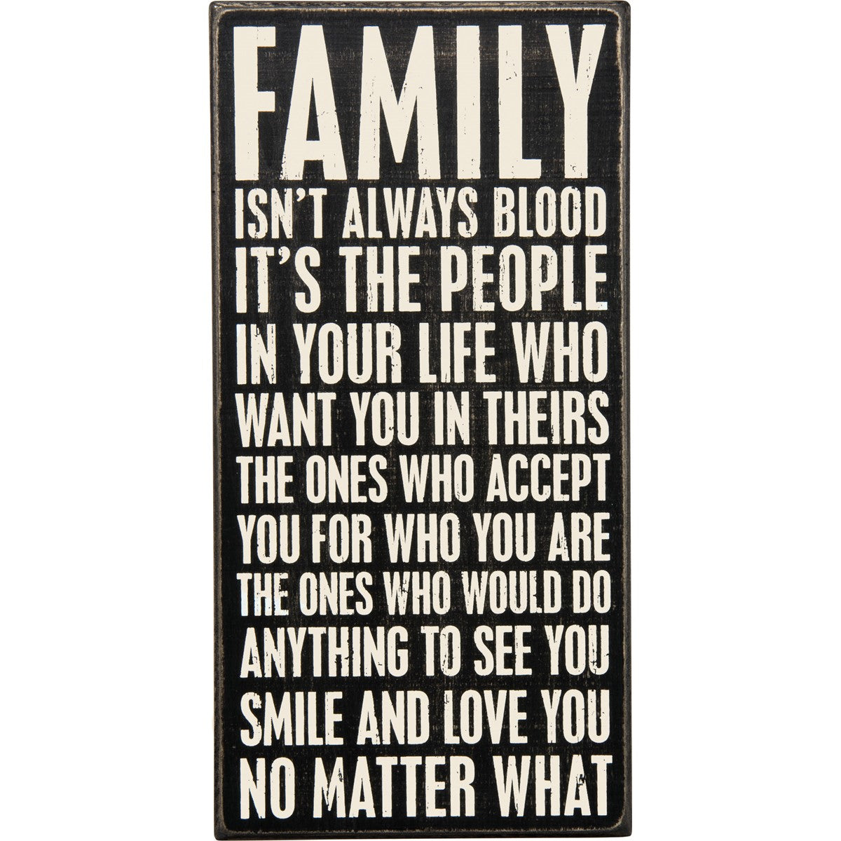 Black wooden box sign with white text reading 'FAMILY ISN'T ALWAYS BLOOD IT'S THE PEOPLE IN YOUR LIFE WHO WANT YOU IN THEIRS'