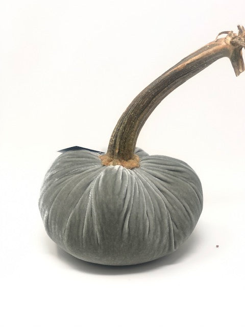 Handmade orange velvet pumpkin with a natural stem.