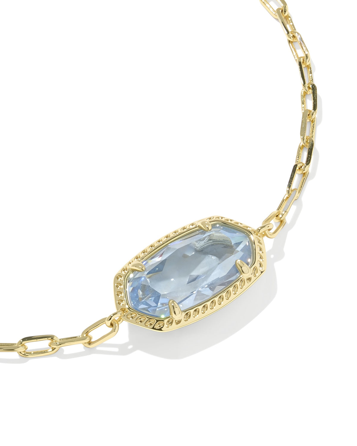 Elaina Luxe Chain Bracelet in gold with a light blue faceted oval stone.