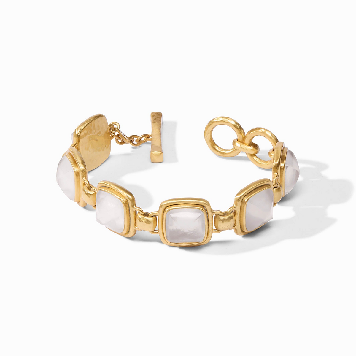 Sahara Stone Bracelet in 24K gold plate with square white glass stones and a toggle closure.