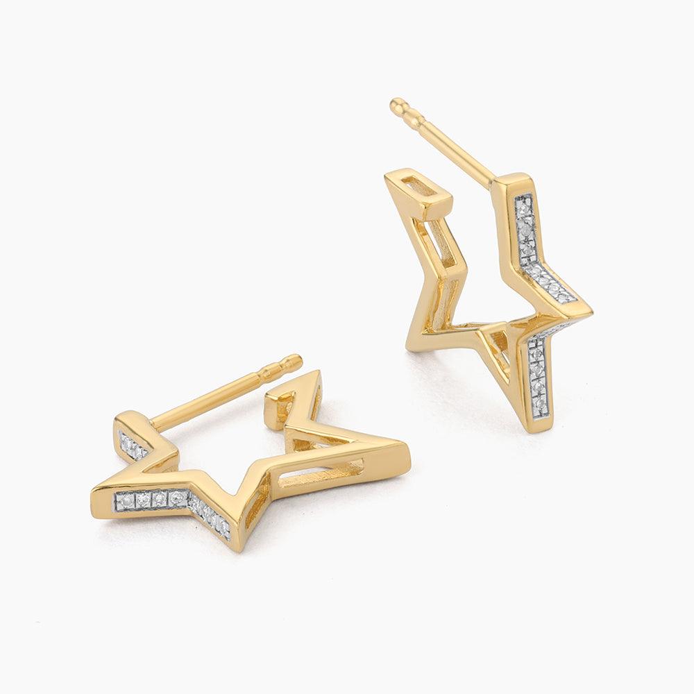 Waterproof stainless steel hoop earrings in gold-plated finish with a star pattern.