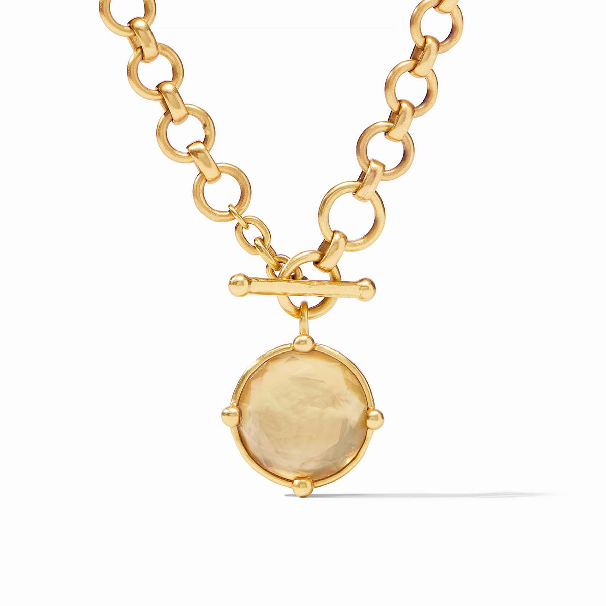 Honeybee Demi Necklace featuring a rose cut stone with beads on one side and a bas relief bee design.
