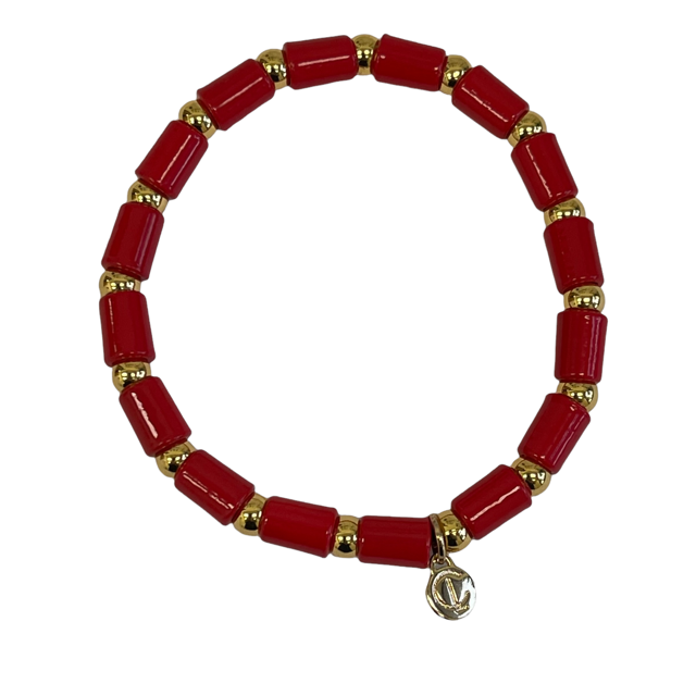 Poppy bracelet featuring a red enamel poppy flower on stretchy 14K overlay cord.