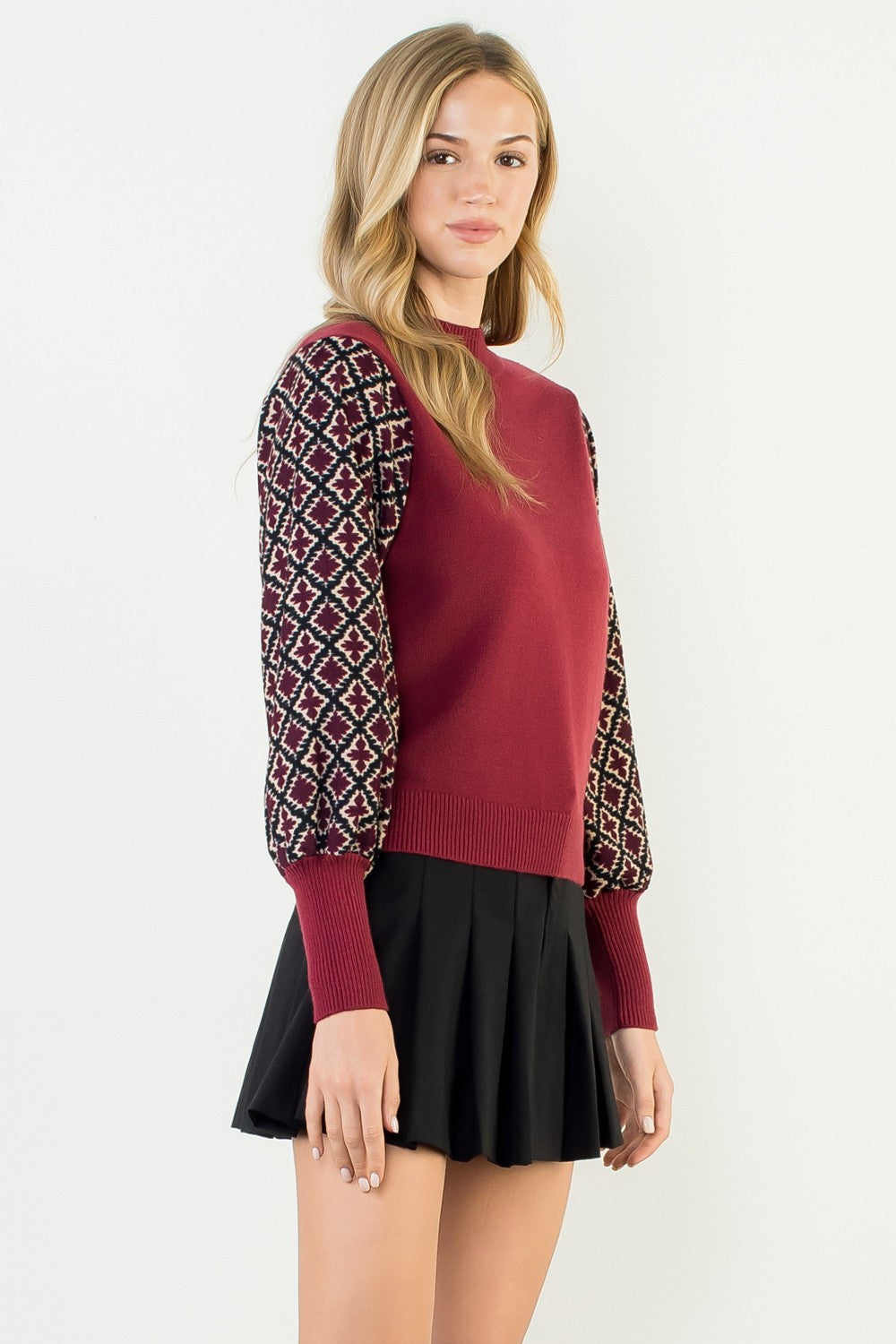 Hannah mixed media knit top in a soft neutral tone with relaxed fit silhouette.