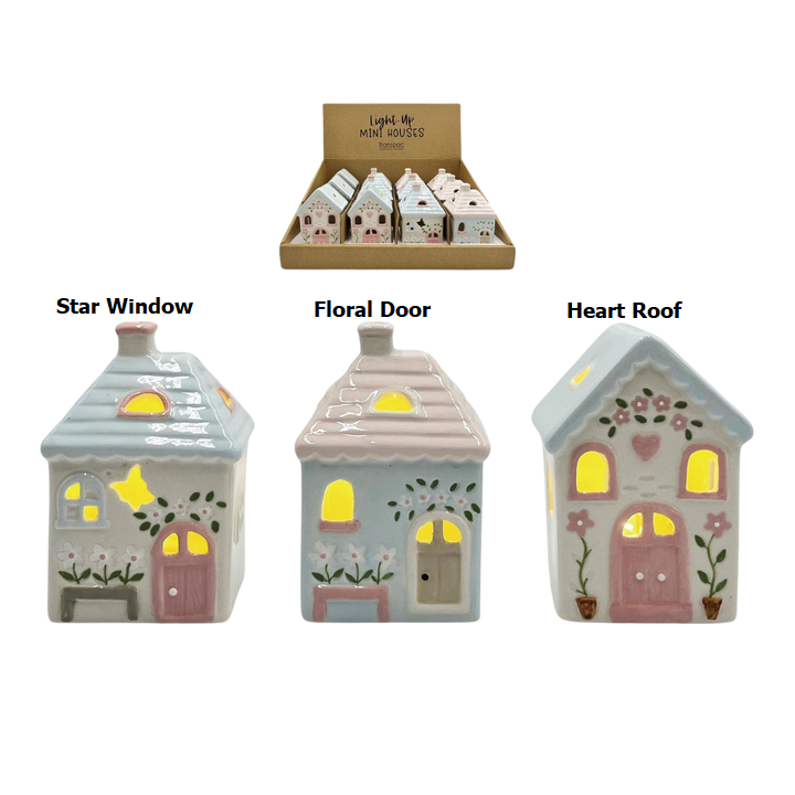 Mini ceramic Easter house with light-up windows in pastel colors.