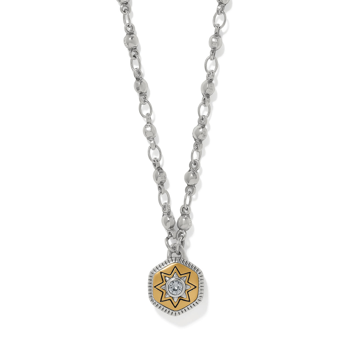 Mosaic Nova Mini Pendant Necklace featuring a two-tone silver and gold starburst design.