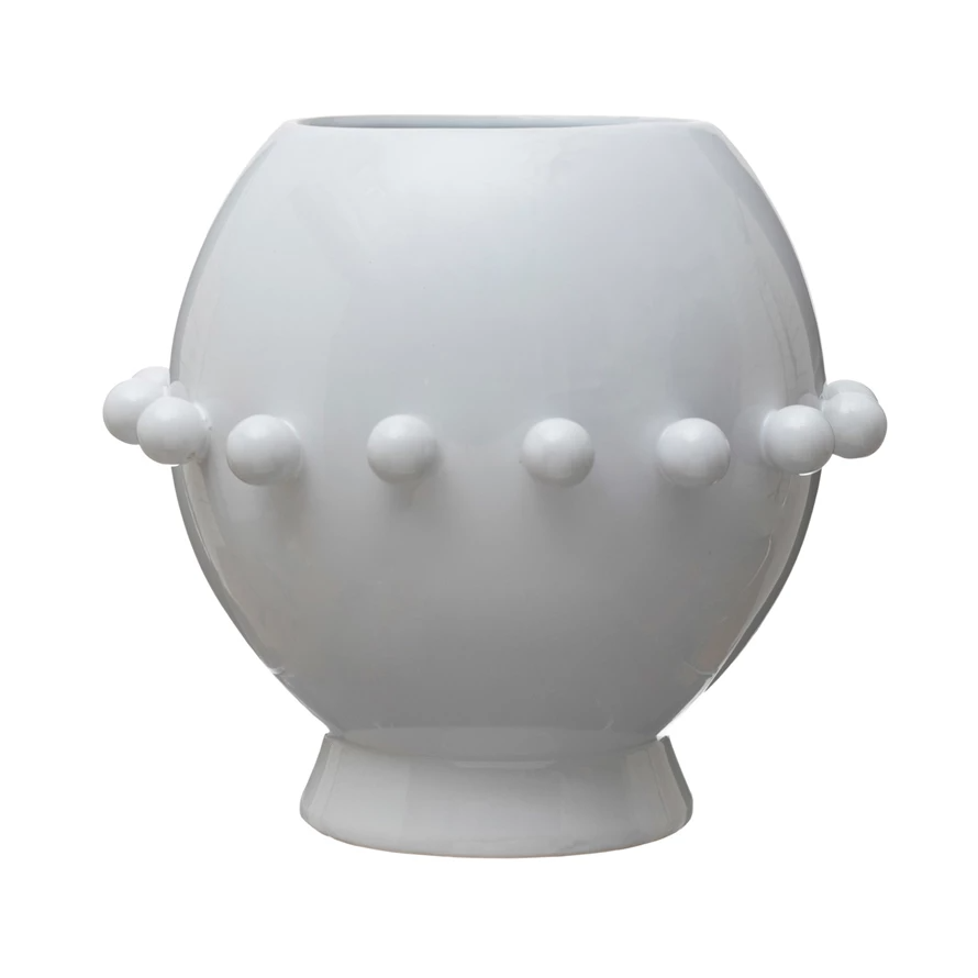 Stoneware planter with raised dot texture in neutral tone
